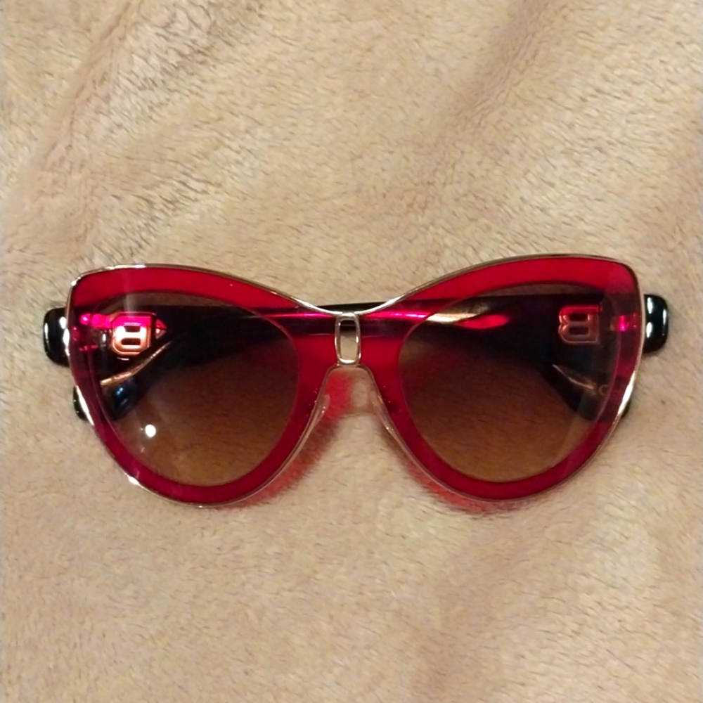 Red/rose gold womens Balenciaga cat eye sunglasses